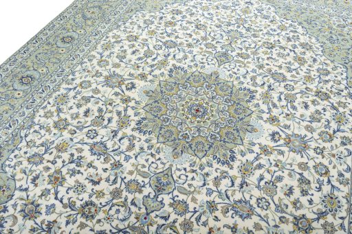Backside of handmade 2000s Kashan rug showing knot structure and weave density