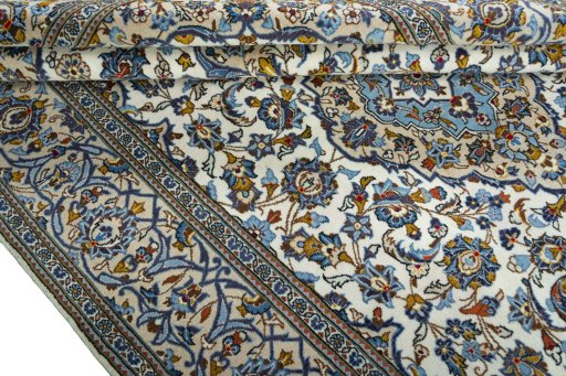 Close-up detail of 2000s Kashan rug from Iran / Persia showing Wool weave