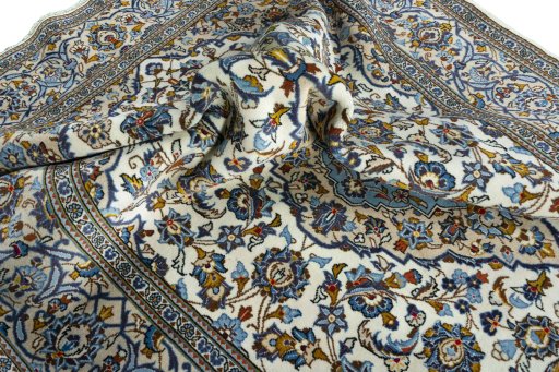 Surface texture of 2000s Kashan rug with natural Wool and intricate pattern