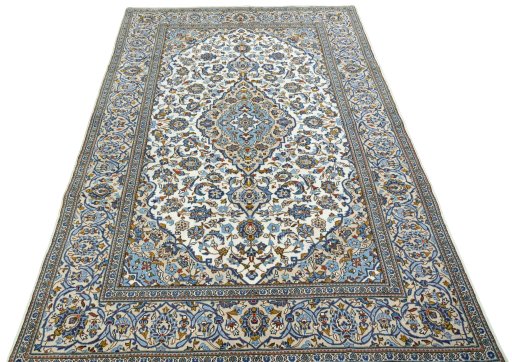Surface texture of 2000s Kashan rug with natural Wool and intricate pattern