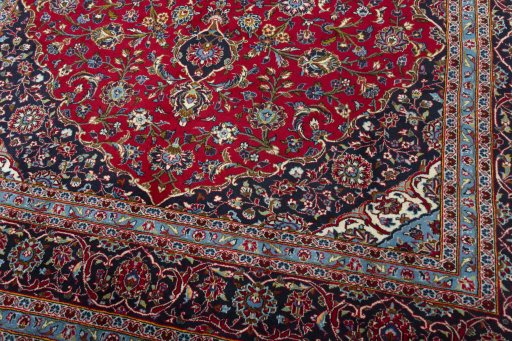 Close-up detail of 2000s Kashan rug from Iran / Persia showing Wool weave