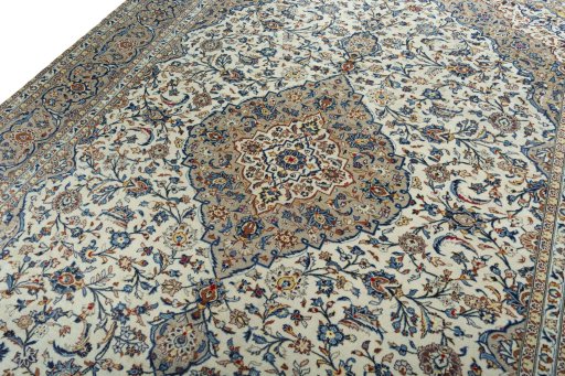Backside of handmade 2000s Kashan rug showing knot structure and weave density