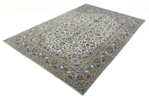 Corner detail of 2000s Kashan rug showing border pattern and Wool pile
