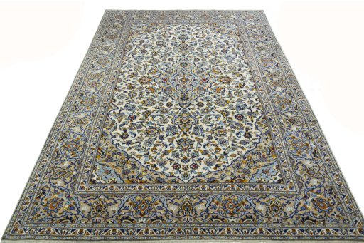 Surface texture of 2000s Kashan rug with natural Wool and intricate pattern