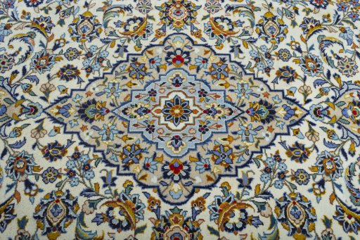 Central medallion detail of 2000s Kashan rug from Iran / Persia