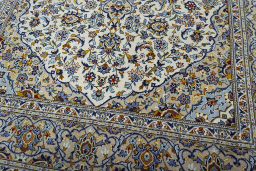 Close-up detail of 2000s Kashan rug from Iran / Persia showing Wool weave