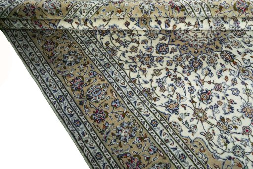 Close-up detail of 2000s Kashan rug from Iran / Persia showing Wool weave