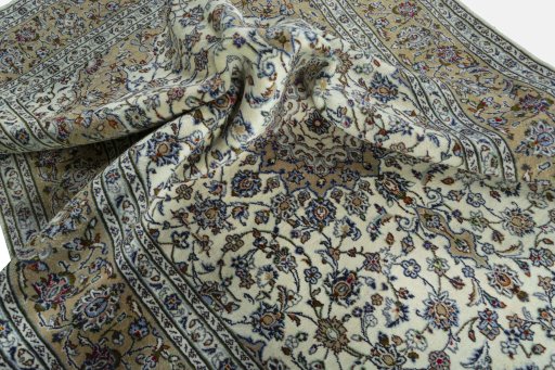 Surface texture of 2000s Kashan rug with natural Wool and intricate pattern