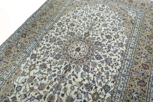 Backside of handmade 2000s Kashan rug showing knot structure and weave density