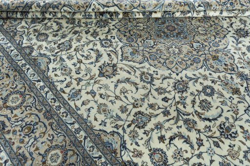 Close-up detail of 2000s Kashan rug from Iran / Persia showing Wool weave