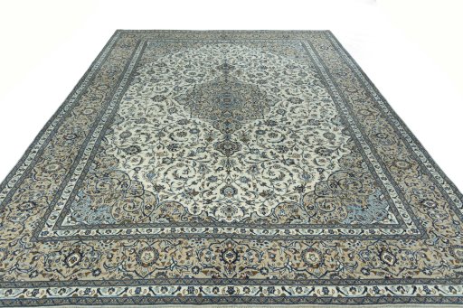Surface texture of 2000s Kashan rug with natural Wool and intricate pattern