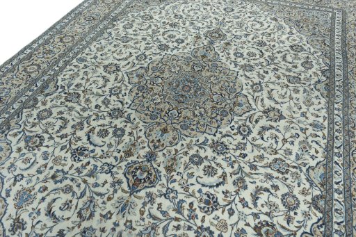 Backside of handmade 2000s Kashan rug showing knot structure and weave density