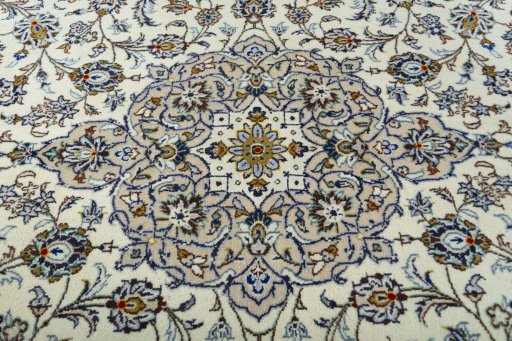 Central medallion detail of 2000s Kashan rug from Iran / Persia