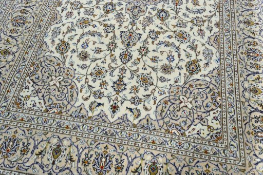 Close-up detail of 2000s Kashan rug from Iran / Persia showing Wool weave