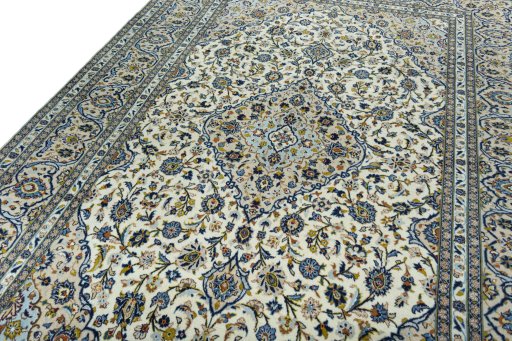Backside of handmade 2000s Kashan rug showing knot structure and weave density