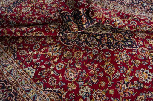 Surface texture of 2000s Kashan rug with natural Wool and intricate pattern