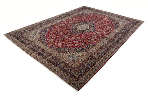 Corner detail of 2000s Kashan rug showing border pattern and Wool pile