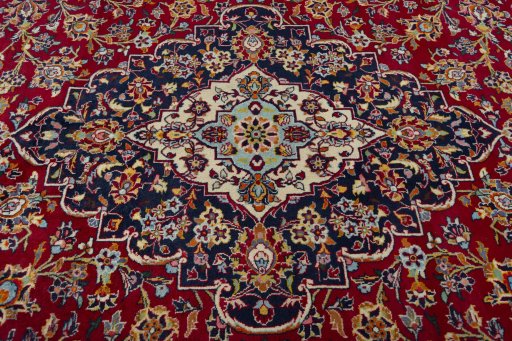 Central medallion detail of 2000s Kashan rug from Iran / Persia