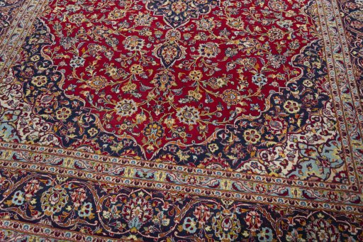 Close-up detail of 2000s Kashan rug from Iran / Persia showing Wool weave
