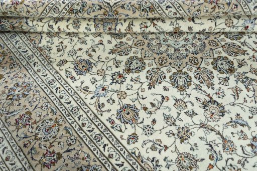 Close-up detail of 2000s Kashan rug from Iran / Persia showing Wool weave