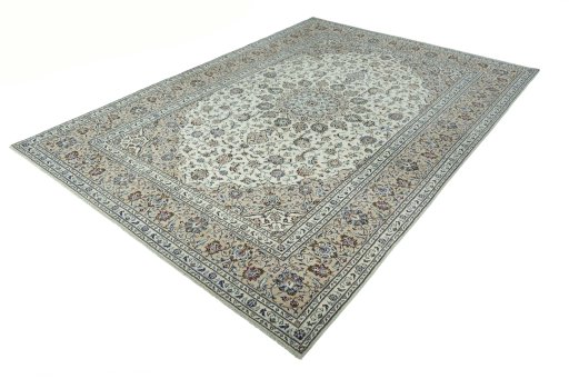 Corner detail of 2000s Kashan rug showing border pattern and Wool pile