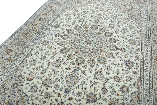 Backside of handmade 2000s Kashan rug showing knot structure and weave density