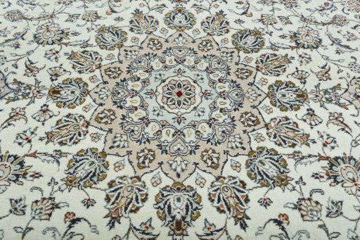 Central medallion detail of 2000s Kashan rug from Iran / Persia