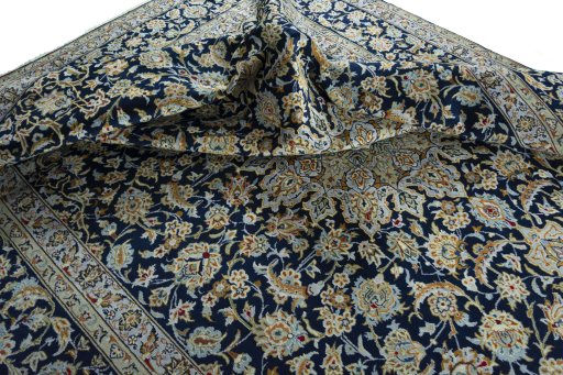 Surface texture of 1970s Kashan rug with natural Wool and intricate pattern