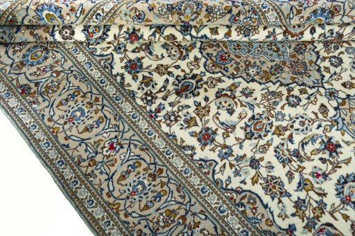 Close-up detail of 2000s Kashan rug from Iran / Persia showing Wool weave