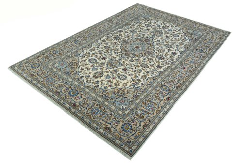 Corner detail of 2000s Kashan rug showing border pattern and Wool pile