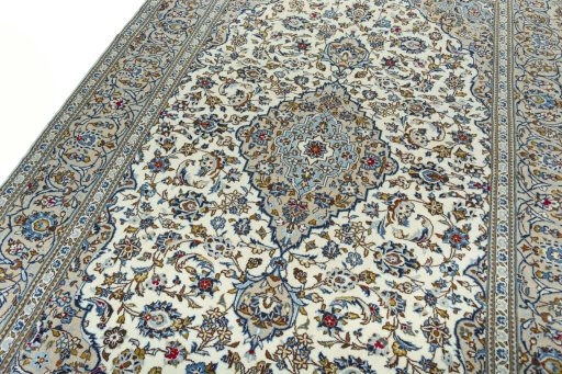 Backside of handmade 2000s Kashan rug showing knot structure and weave density