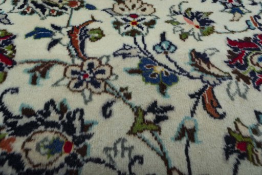 Central medallion detail of 2000s Kashan rug from Iran / Persia
