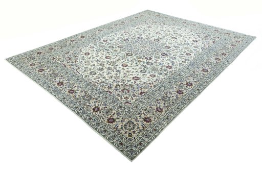 Corner detail of 2000s Kashan rug showing border pattern and Wool pile
