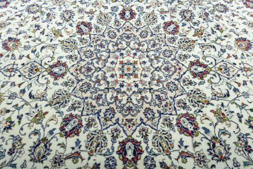 Central medallion detail of 2000s Kashan rug from Iran / Persia