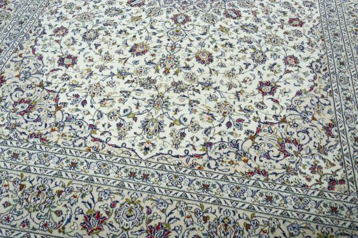 Close-up detail of 2000s Kashan rug from Iran / Persia showing Wool weave