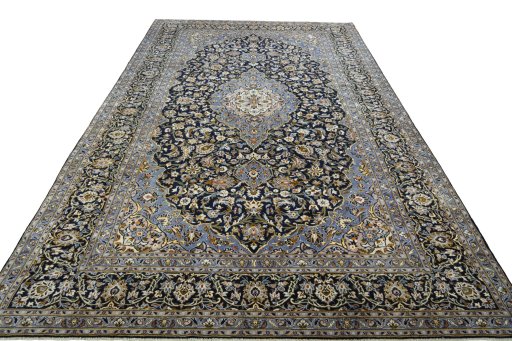 Surface texture of 2000s Kashan rug with natural Wool and intricate pattern