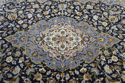 Central medallion detail of 2000s Kashan rug from Iran / Persia