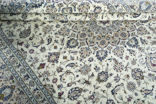 Close-up detail of 2000s Kashan rug from Iran / Persia showing Wool weave