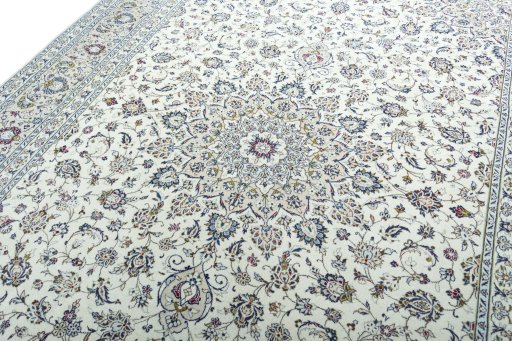 Backside of handmade 2000s Kashan rug showing knot structure and weave density