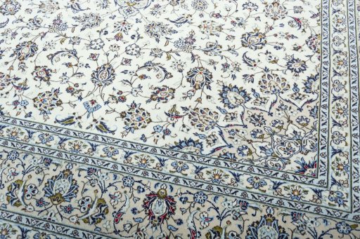 Close-up detail of 2000s Kashan rug from Iran / Persia showing Wool weave