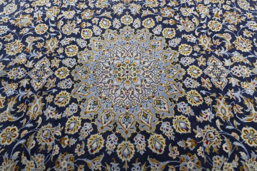 Central medallion detail of 1970s Kashan rug from Iran / Persia