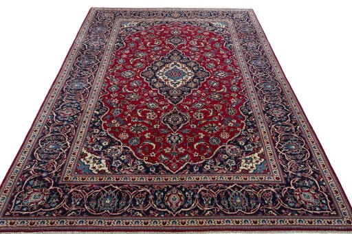 Surface texture of 2000s Kashan rug with natural Wool and intricate pattern