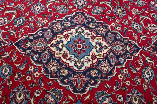 Central medallion detail of 2000s Kashan rug from Iran / Persia