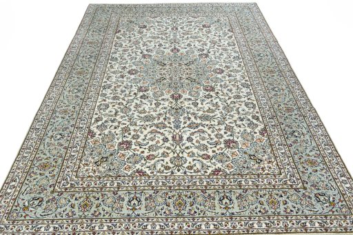 Surface texture of 2000s Kashan rug with natural Wool and intricate pattern