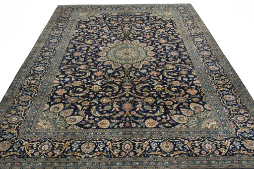 Surface texture of 2000s Kashan rug with natural Wool and intricate pattern