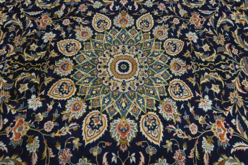 Central medallion detail of 2000s Kashan rug from Iran / Persia