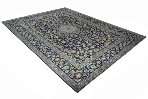 Close-up detail of 2000s Kashan rug from Iran / Persia showing Wool weave