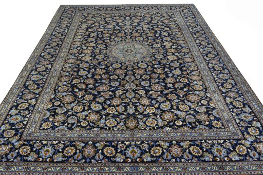 Surface texture of 2000s Kashan rug with natural Wool and intricate pattern
