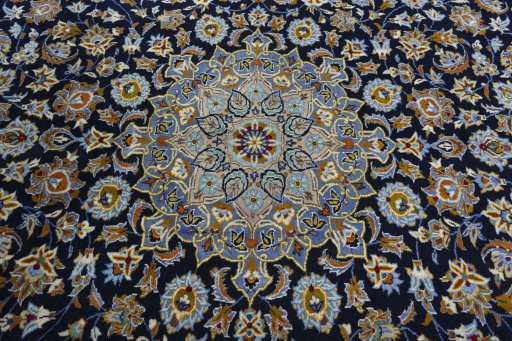 Central medallion detail of 2000s Kashan rug from Iran / Persia