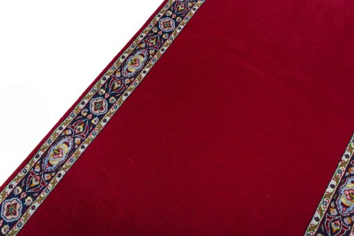 Backside of handmade 2000s Kashan rug showing knot structure and weave density